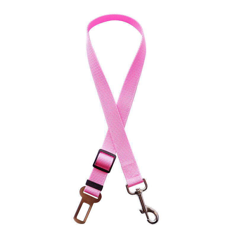 Adjustable pet car seat belt with pink strap, metal hook, and buckle end