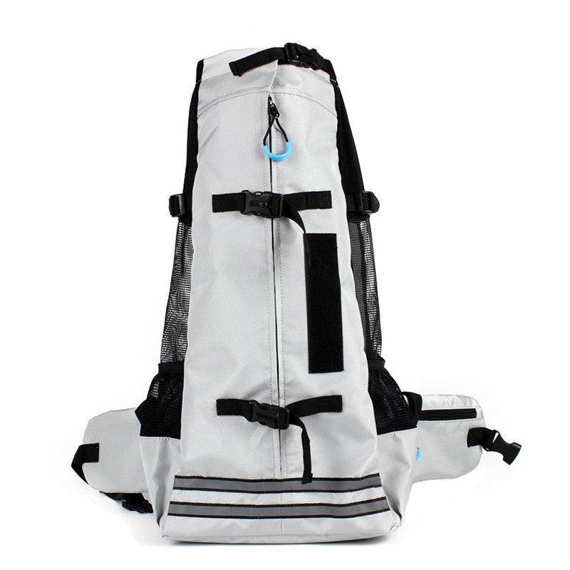 White pet carrier backpack with black trim, front zipper, and mesh side panels