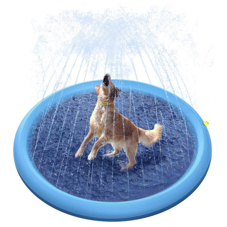Blue round pet splash mat with one dog leaping through water spray
